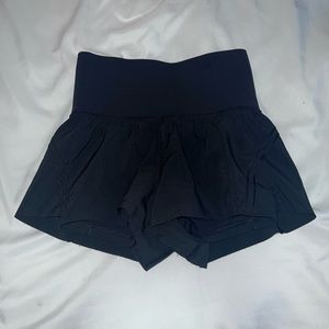 Lululemon high rise 2.5” black yoga shorts. Size 2